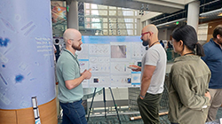 Postdoc Gabe Kreider-Letterman with poster he won award for at the Triangle Cytoskeleton Club Meeting September, 2024.